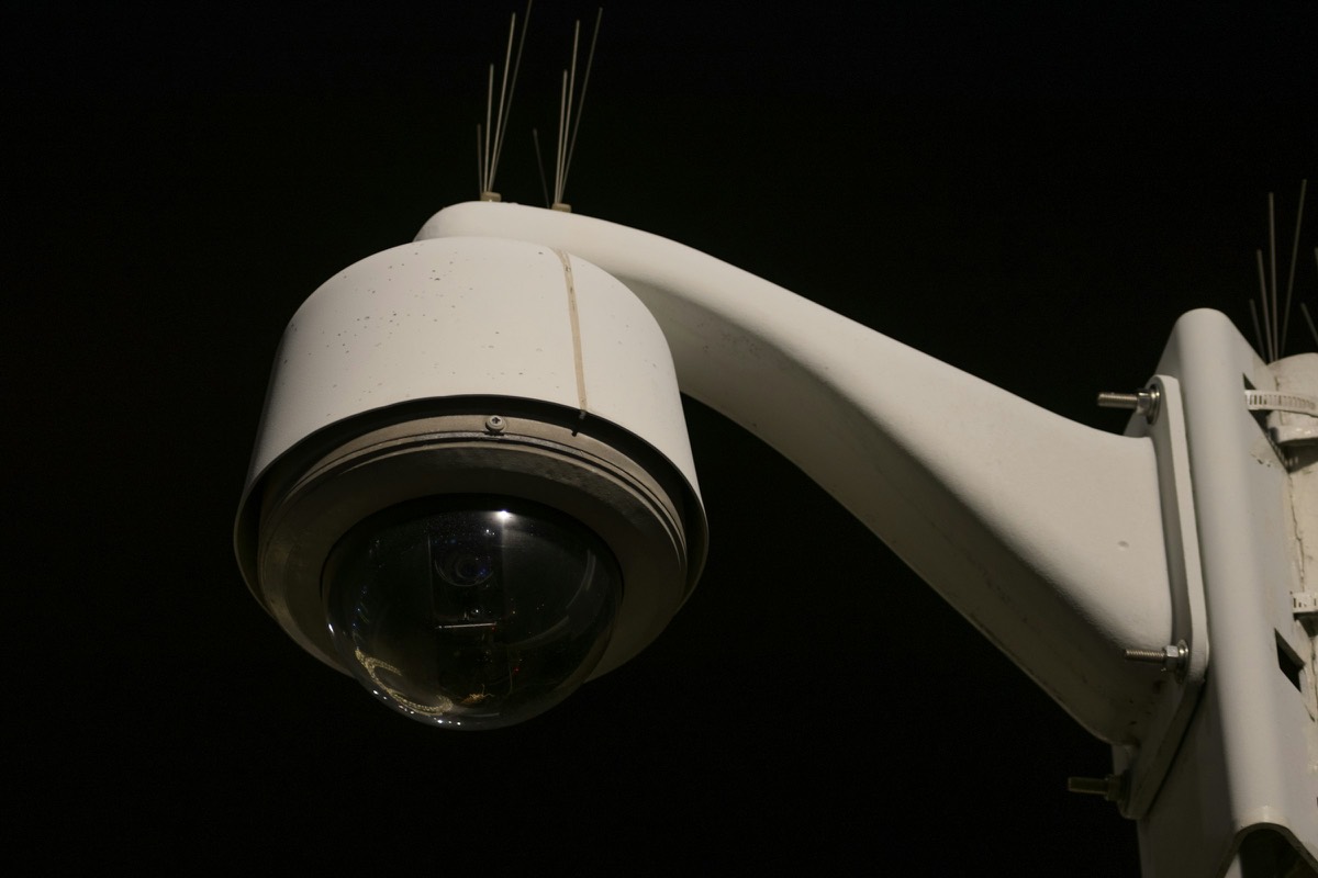 Dome security camera on a mounting arm